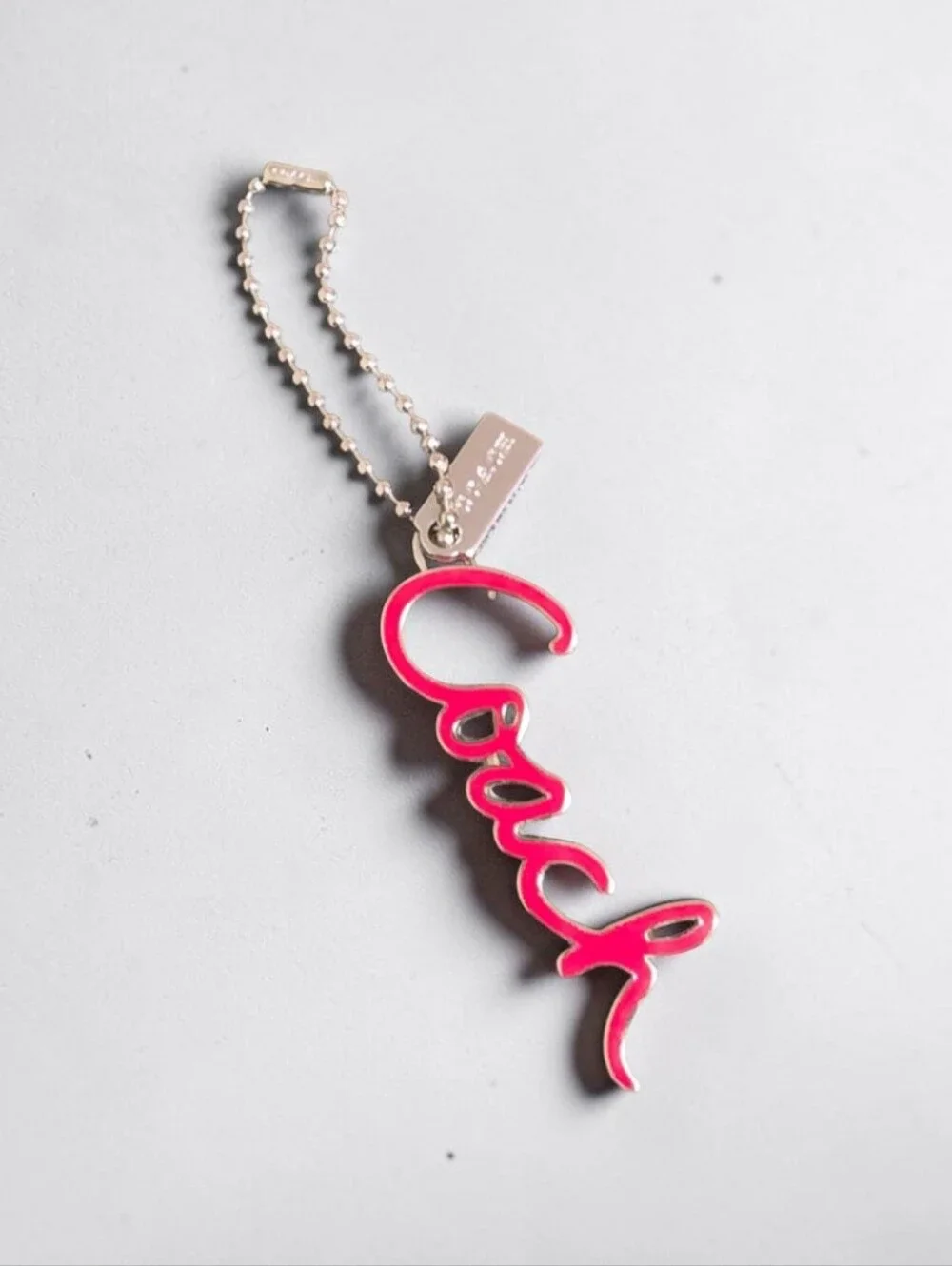 Coach Pink Script Logo Key Holder with Silver Tone Chain